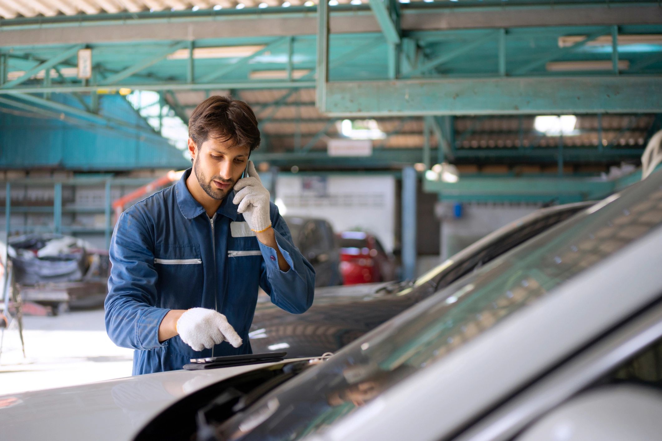Technician performing smartphone repair
